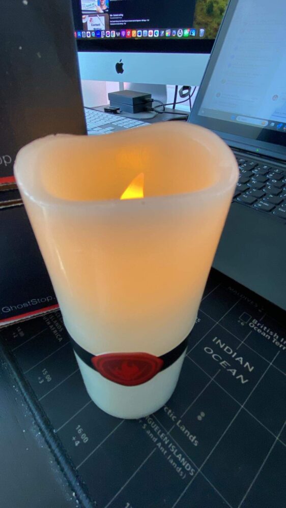 A spirit candle with the EMF flickering light