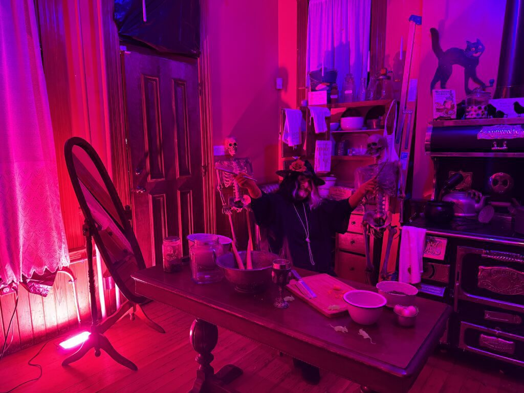 Kitchen witch making rat-stick-stone stew for us